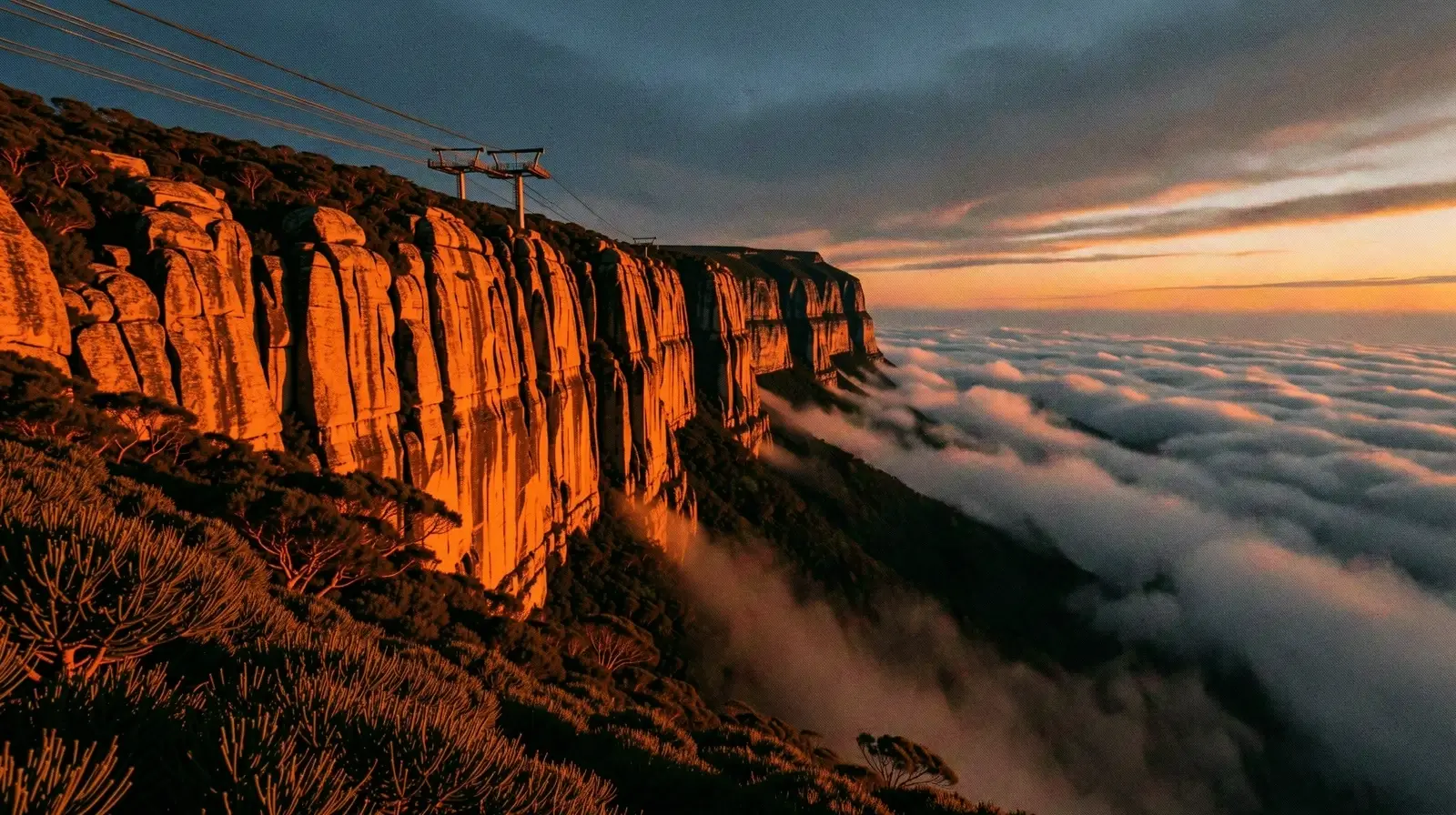 The granite cliffs of Table Mountain under dramatic Cape Town light